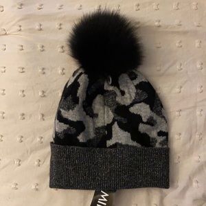 Grey camo Mitchies brand beanie.